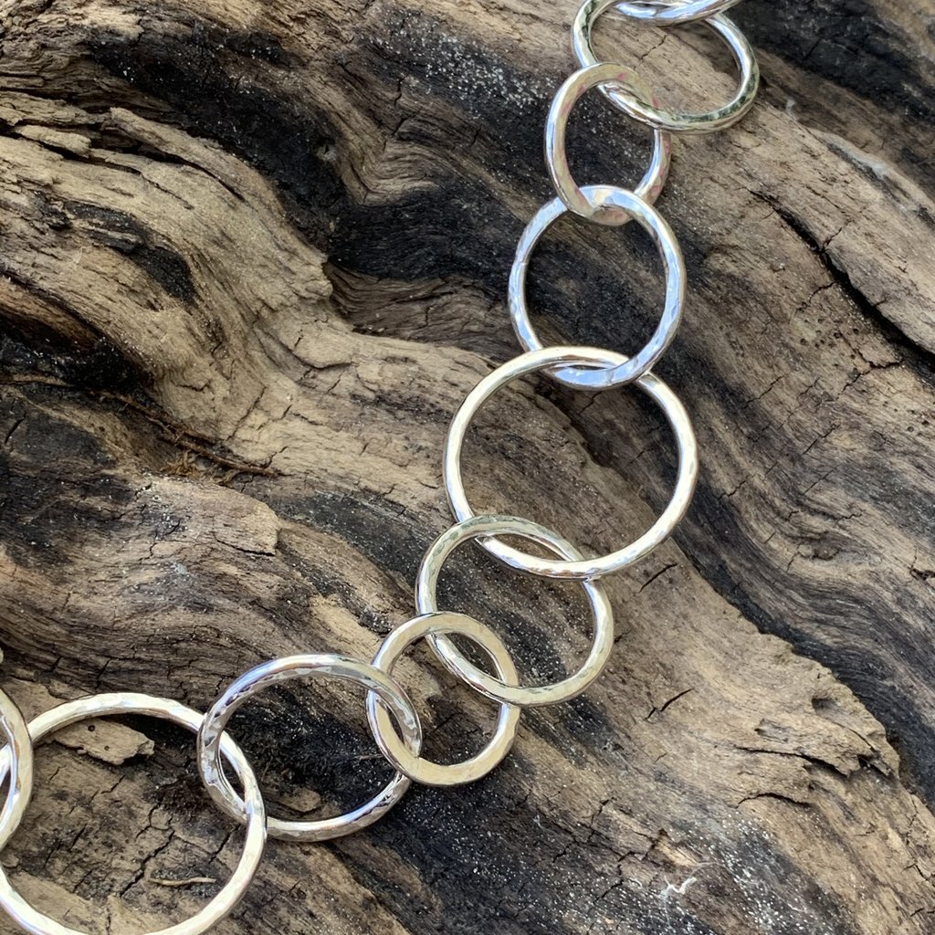 Caldera Cirque Link - 20" handmade hammered silver necklace - close-up
