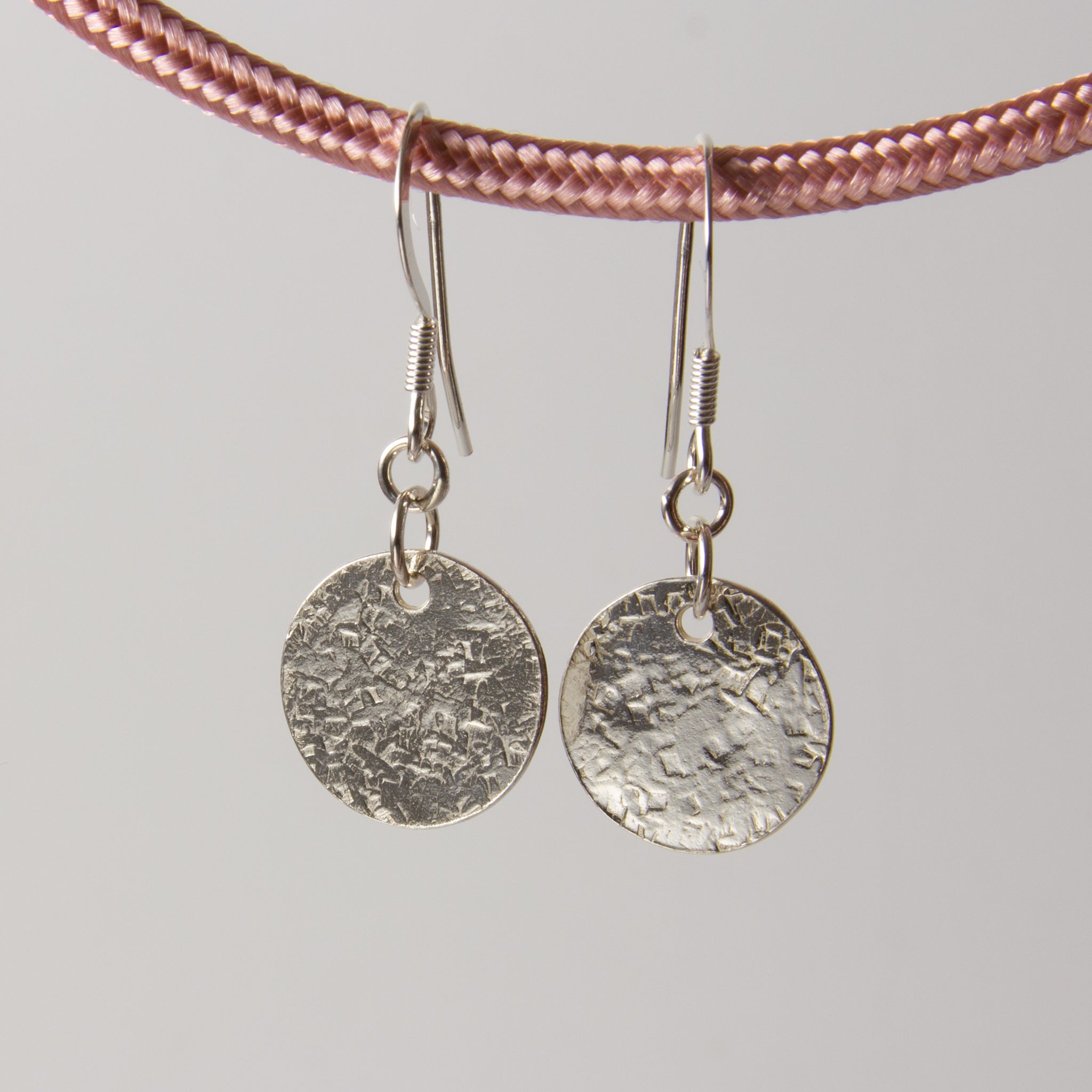 Luna seta silver drop earrings. Silk moon textured earrings