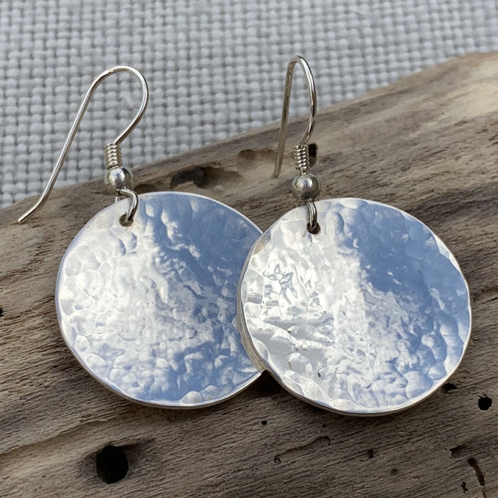 Caldera Lunelle hammered silver earrings close-up