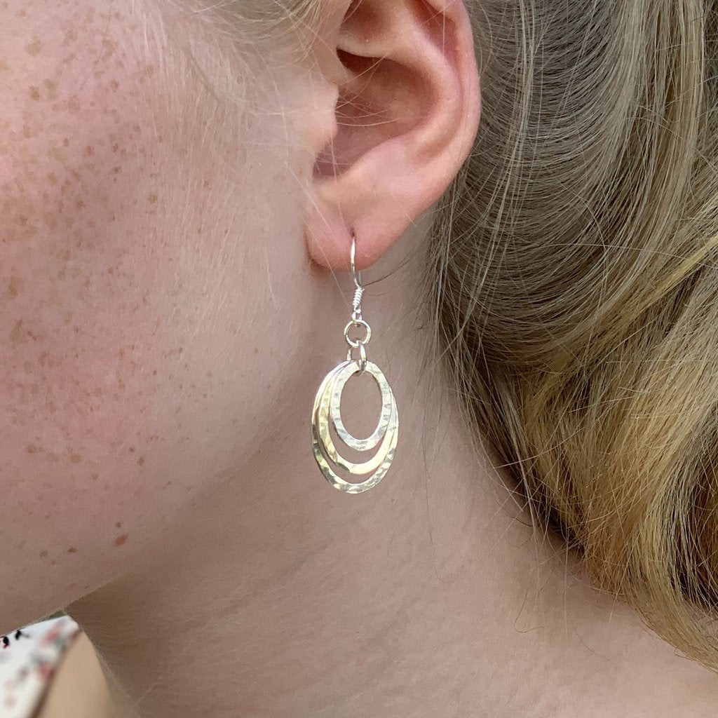 aldera ovale triplo handmade silver earrings on model