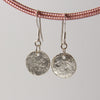 Luna seta silver drop earrings.  Silk moon textured earrings