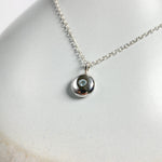 Sterling Silver Pebble Charm Pendant with Sky Blue Topaz